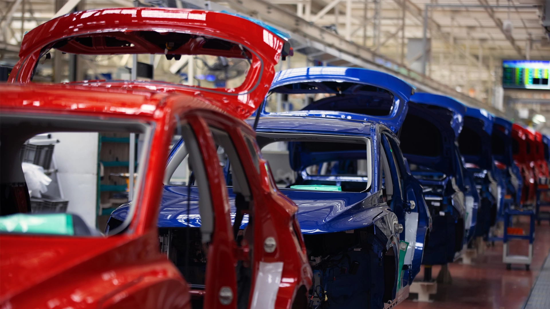 cars on an assembly line